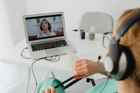 Why Enterprise Security Startups Are Targeting Remote Healthcare Workers Healthcare professional working on laptop computer with medical documents and stethoscope on desk