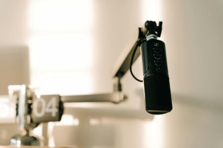 How Spotify’s Podcast Monetization Changes Are Affecting Independent Creators Professional podcast recording setup with microphone and audio equipment in modern studio