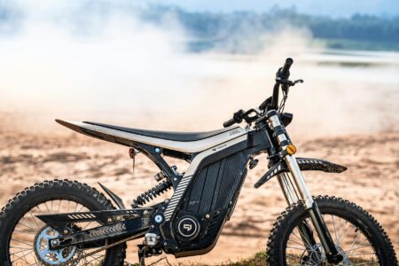 Why Former Tesla Engineers Are Building Electric Motorcycle Companies Modern electric motorcycle parked on urban street