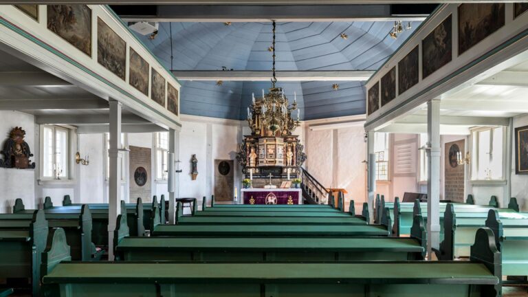 Why Former Netflix Engineers Are Building Streaming Platforms for Churches Modern church interior with lighting and video screens for streaming services