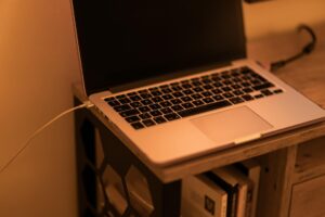 Comparing MacBook Air M3 vs Dell XPS 13 for Remote Workers Modern laptop computer on clean desk setup for remote work