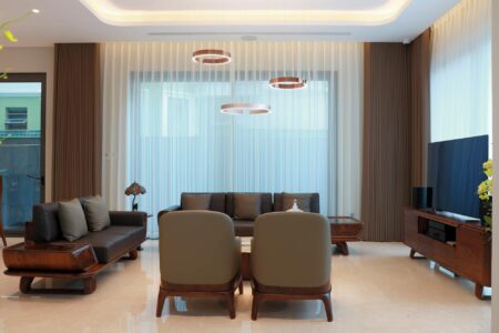 Modern living room with sectional sofa and coffee table showing furniture arrangement