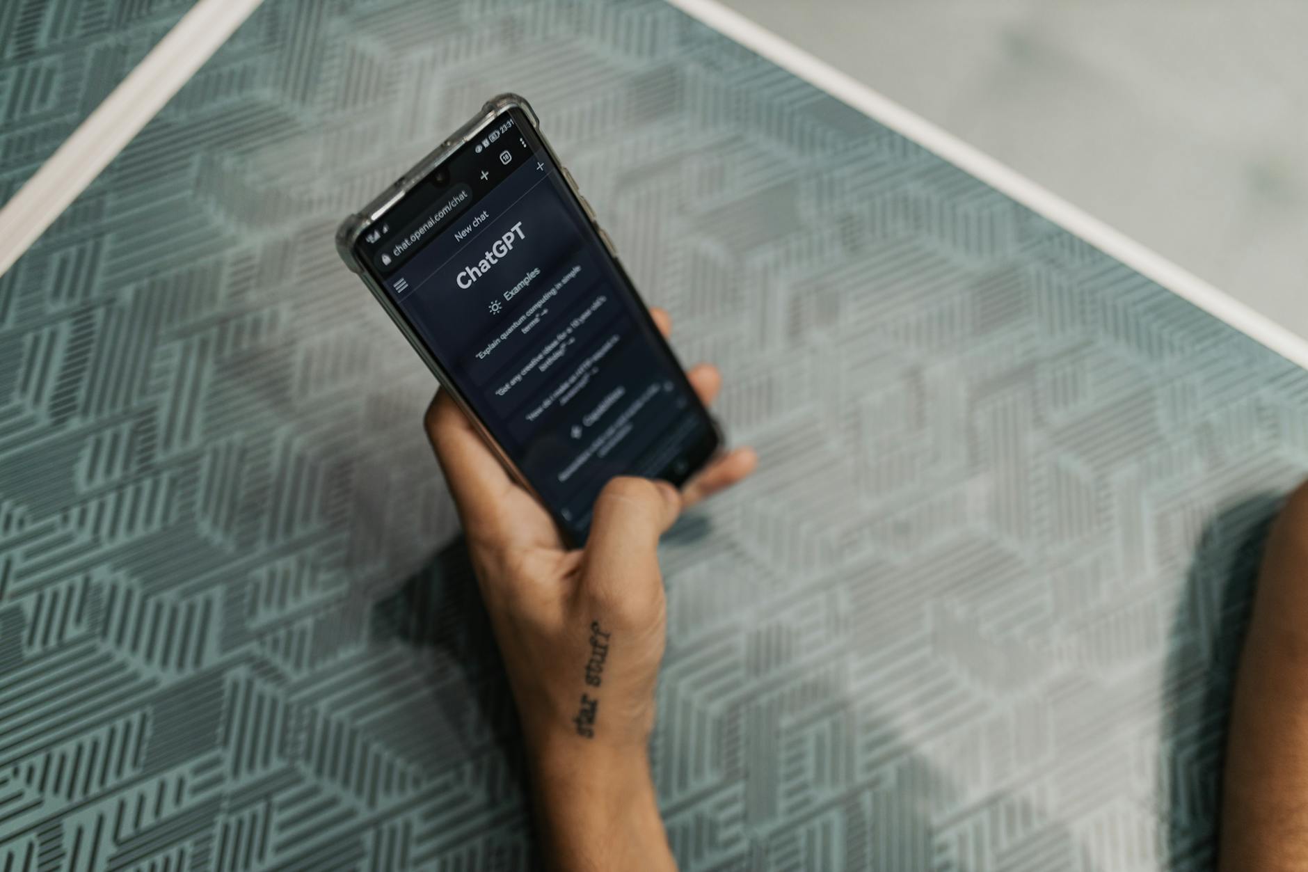 Mobile phone displaying chat conversation interface for customer support