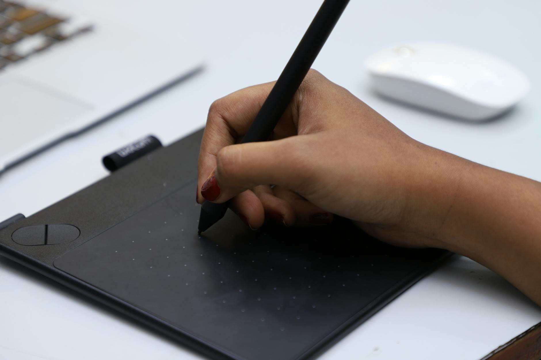Digital drawing tablet with stylus pen for creative design work