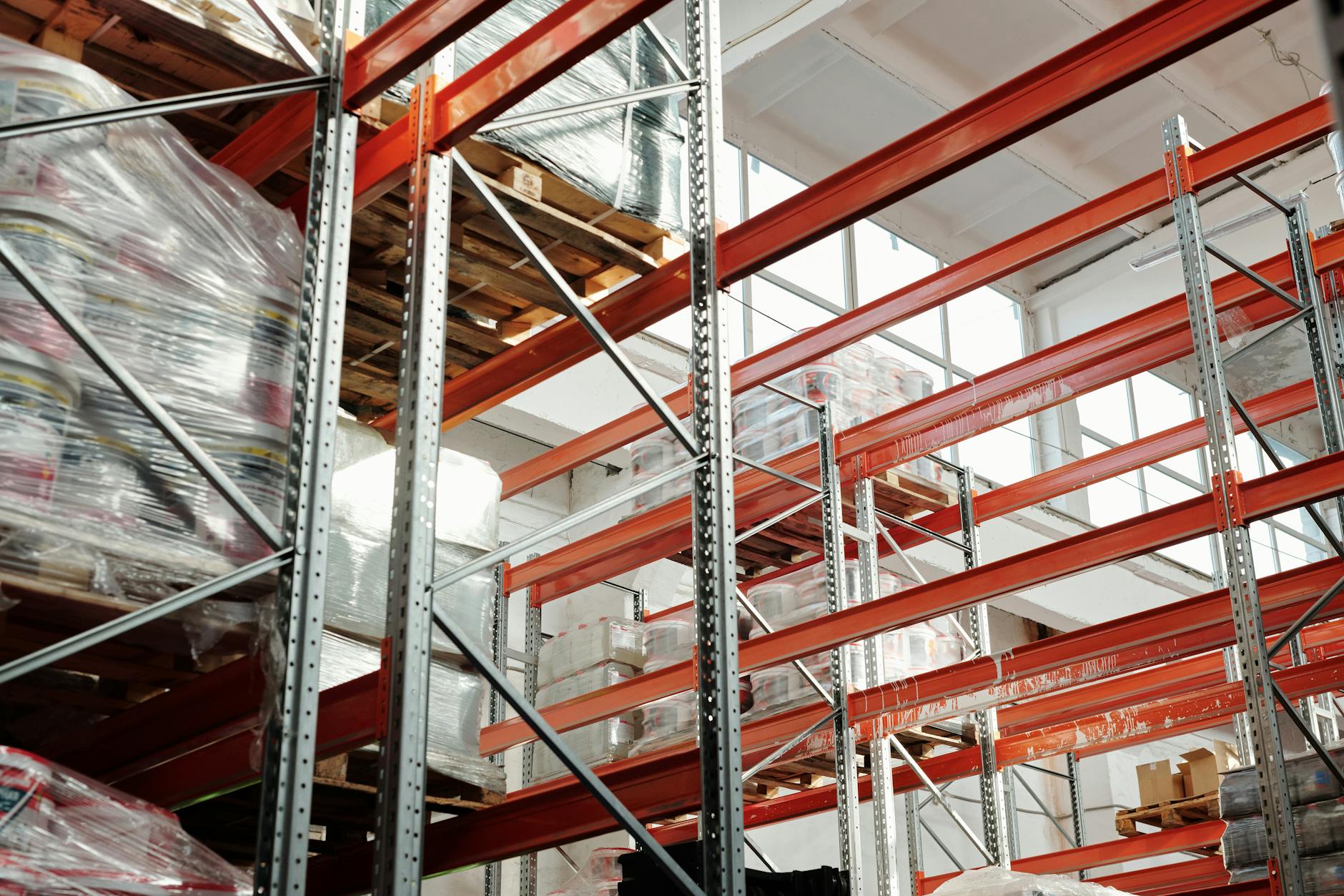 Large warehouse interior with shelving and industrial storage systems