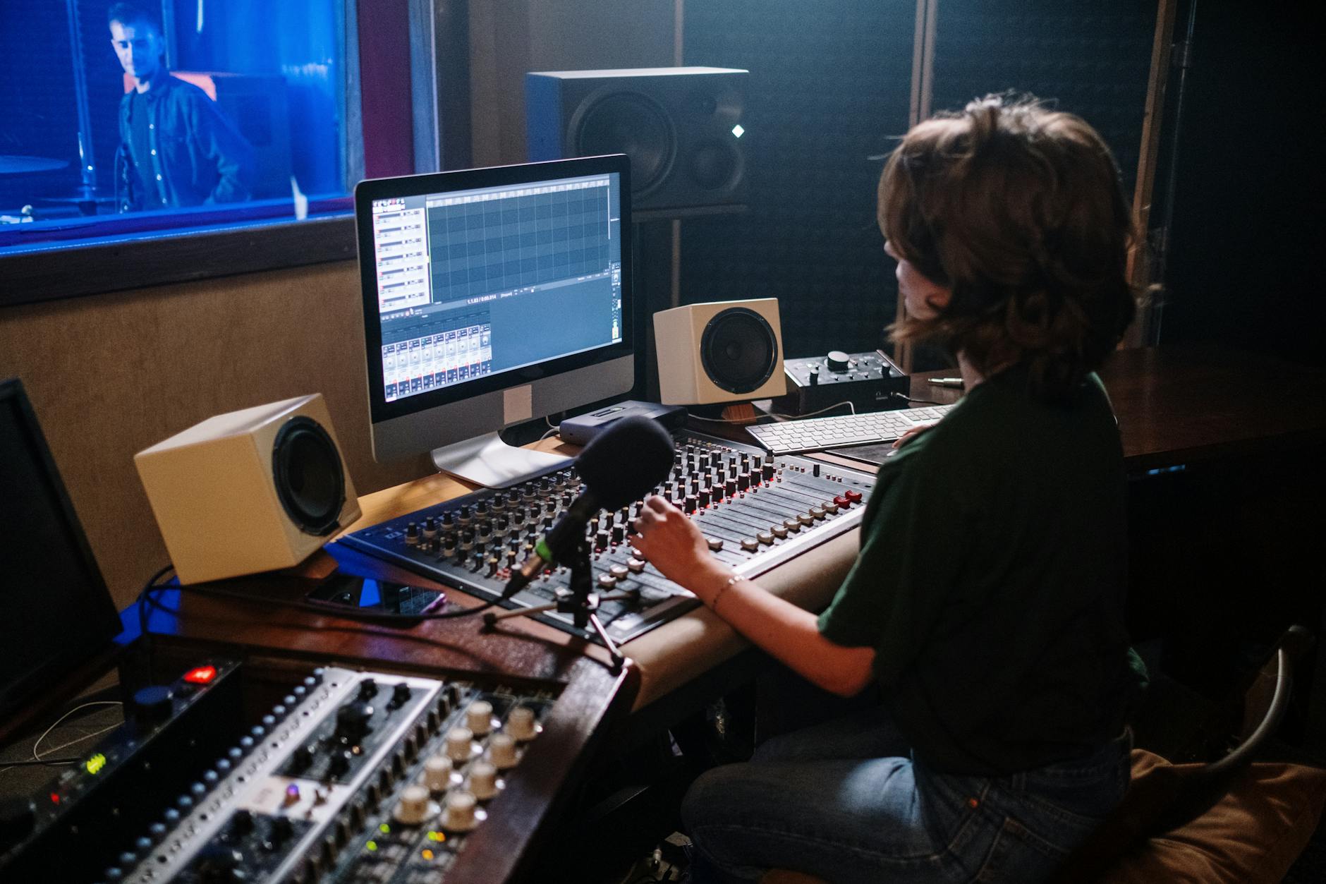 Modern recording studio with audio equipment and mixing board