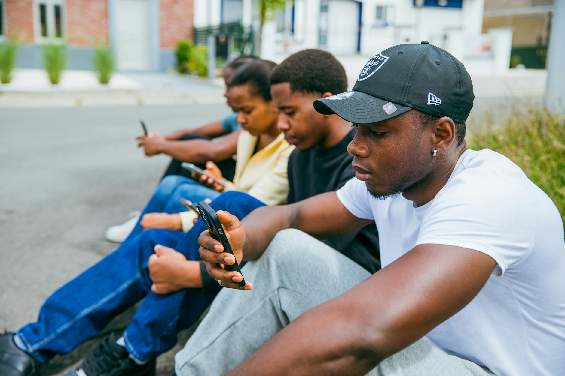 Urban street intersection showing modern traffic infrastructure and digital monitoring systems