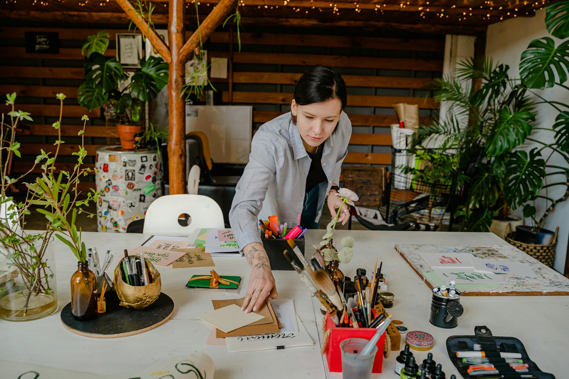 Modern creative workspace with tablet, stylus, and design tools on desk