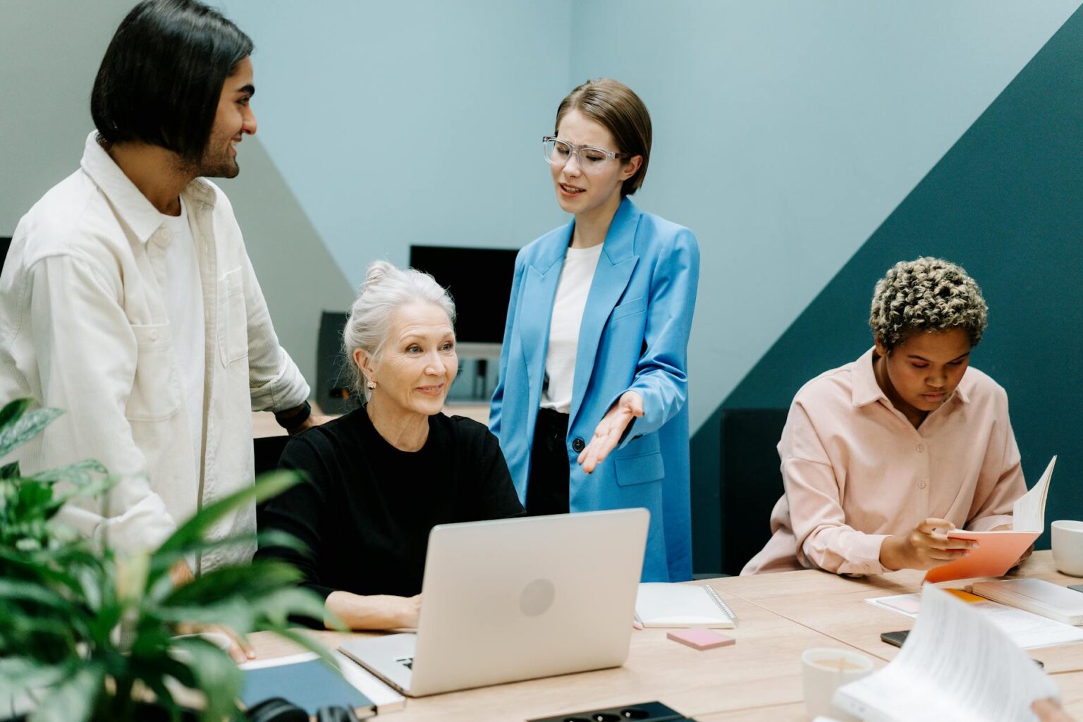Rippling’s HR Platform Is Quietly Eating Workday’s Mid-Market Share HR team reviewing employee data on laptops in a modern office setting