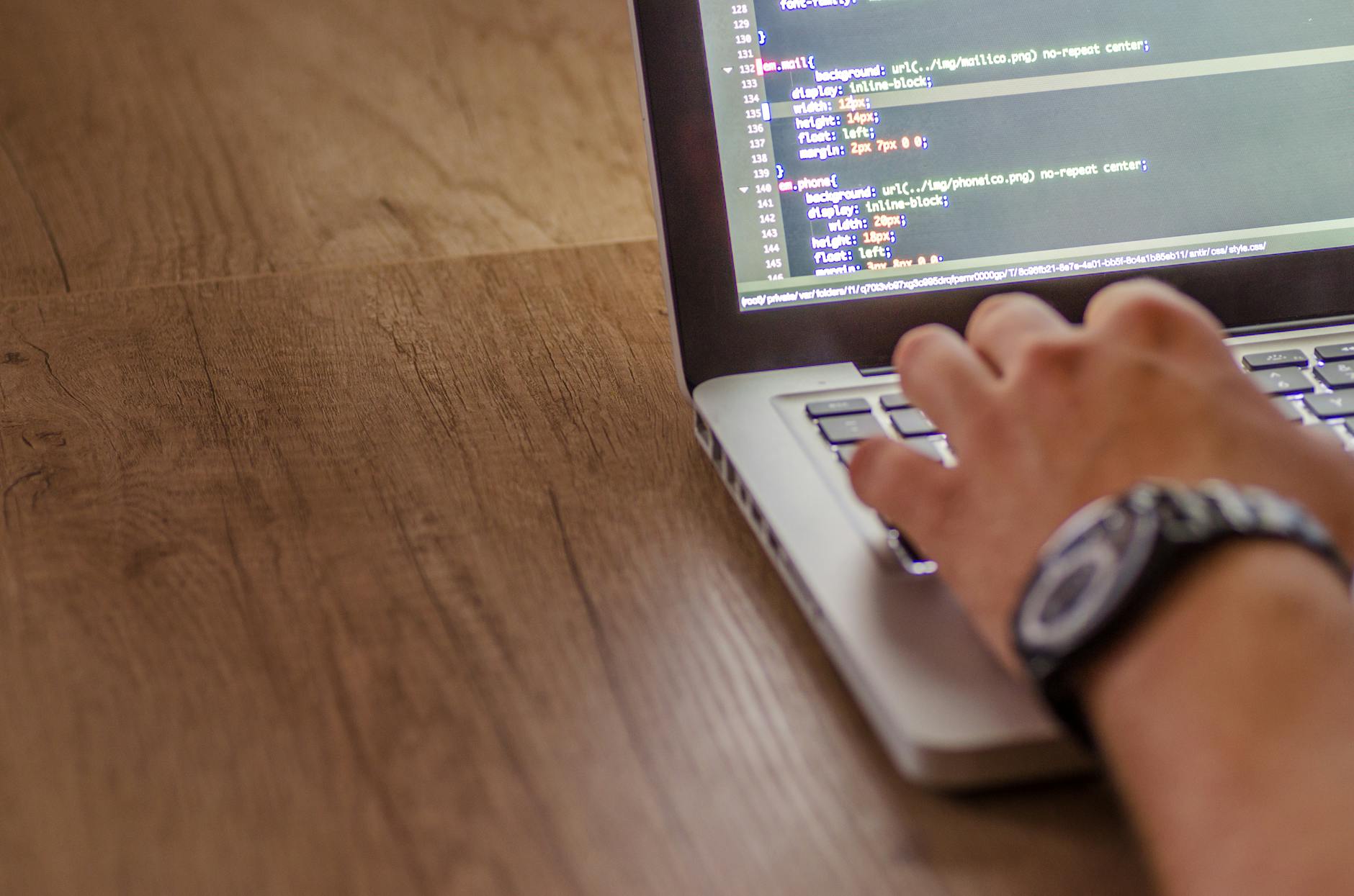 A developer working on a laptop, representing frontend engineering workflows