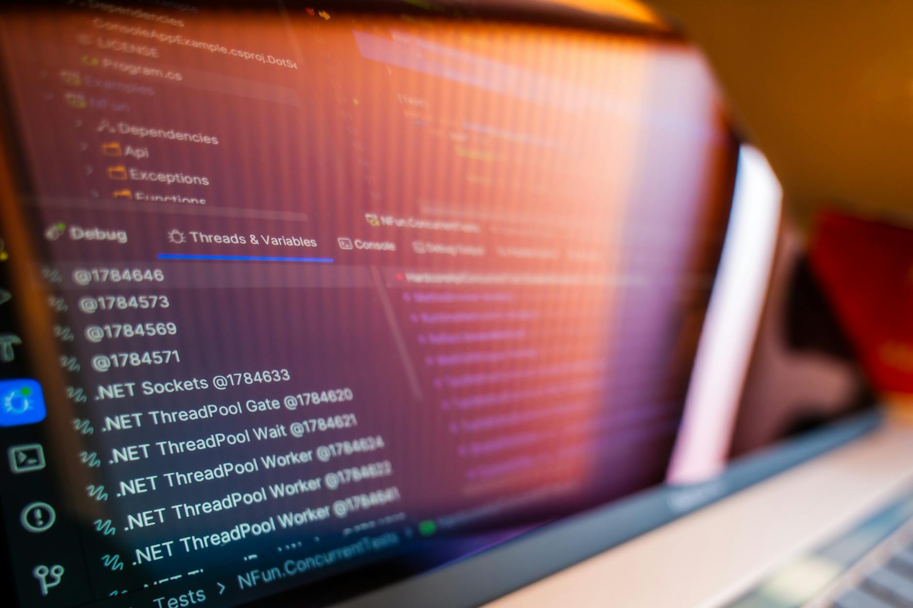 A laptop screen displaying lines of code in a browser-based development environment