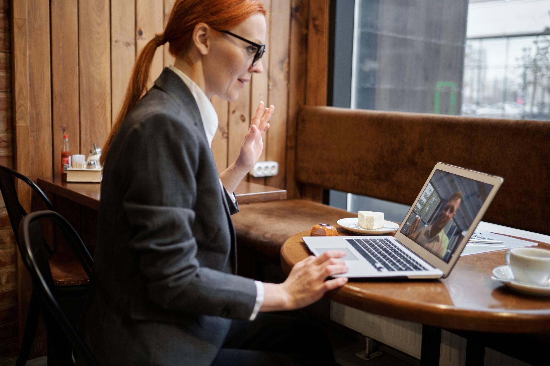 Remote worker in a home office participating in an asynchronous work session