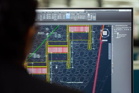 Figma’s AI Features Are Quietly Threatening Framer’s Design Base Designer working on a UI layout in a digital design application