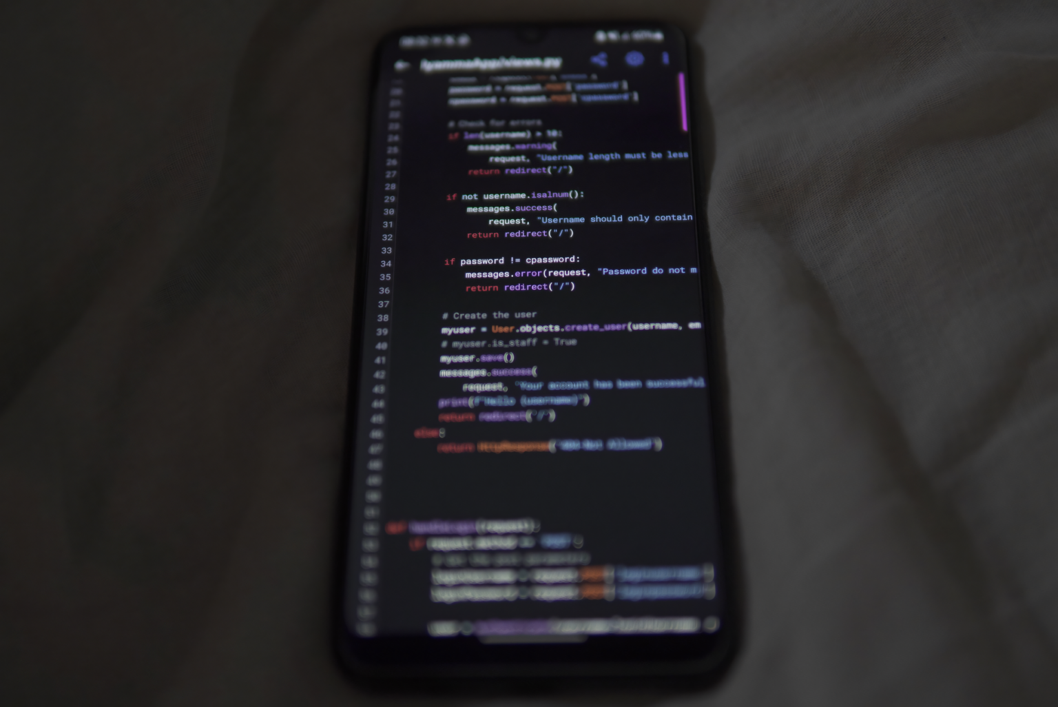 Developer reviewing an AI workflow diagram on a monitor
