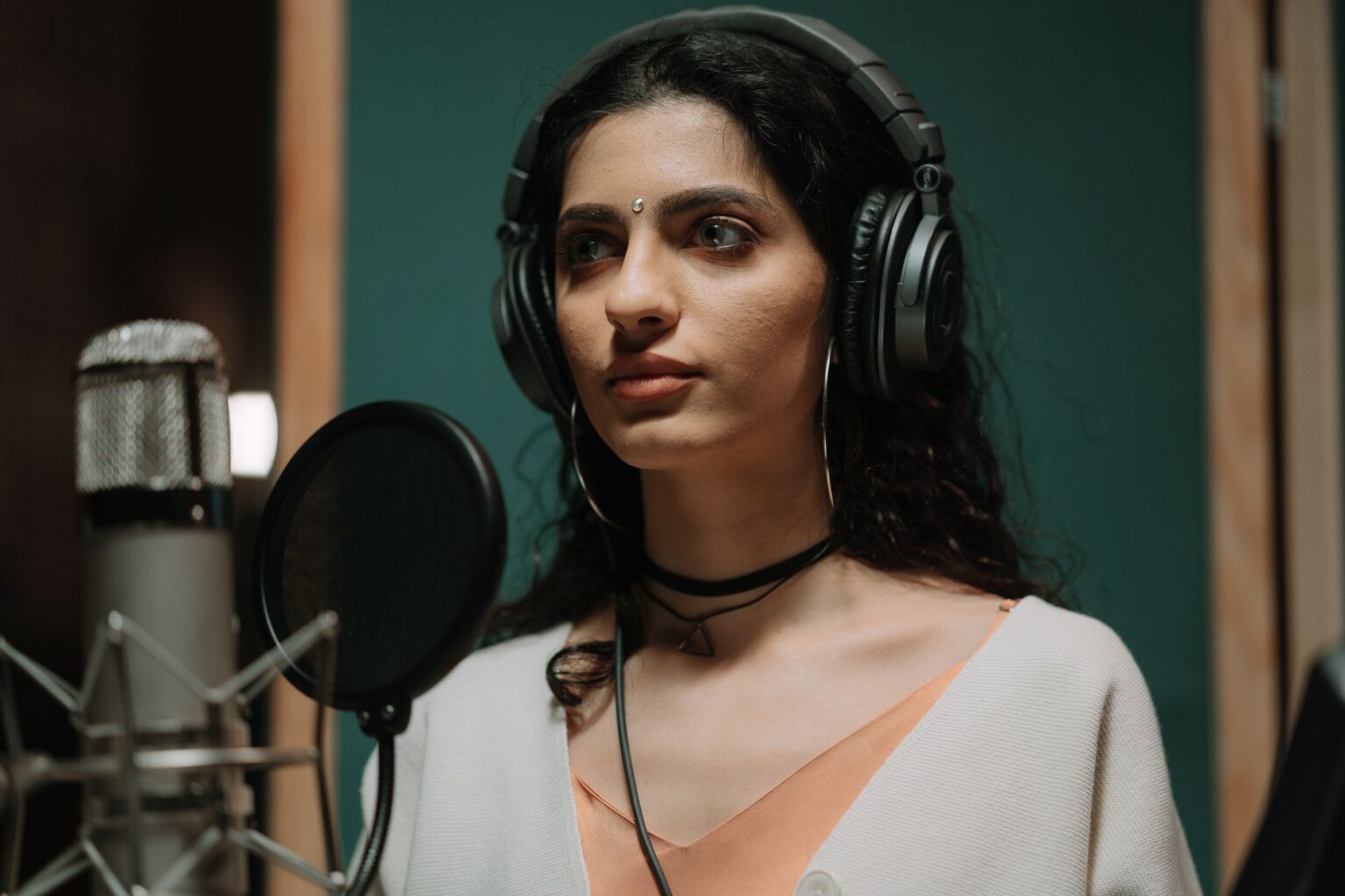 Professional voice recording studio with microphone and audio equipment