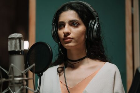Professional voice recording studio with microphone and audio equipment