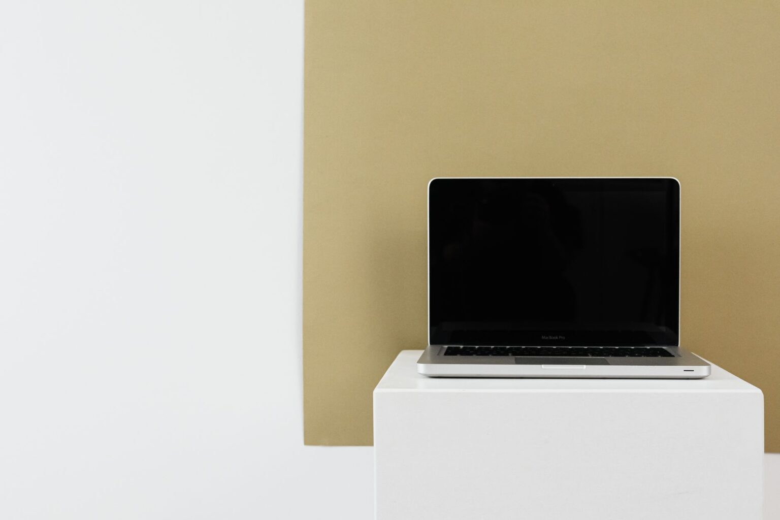 Person working on a presentation design on a laptop computer