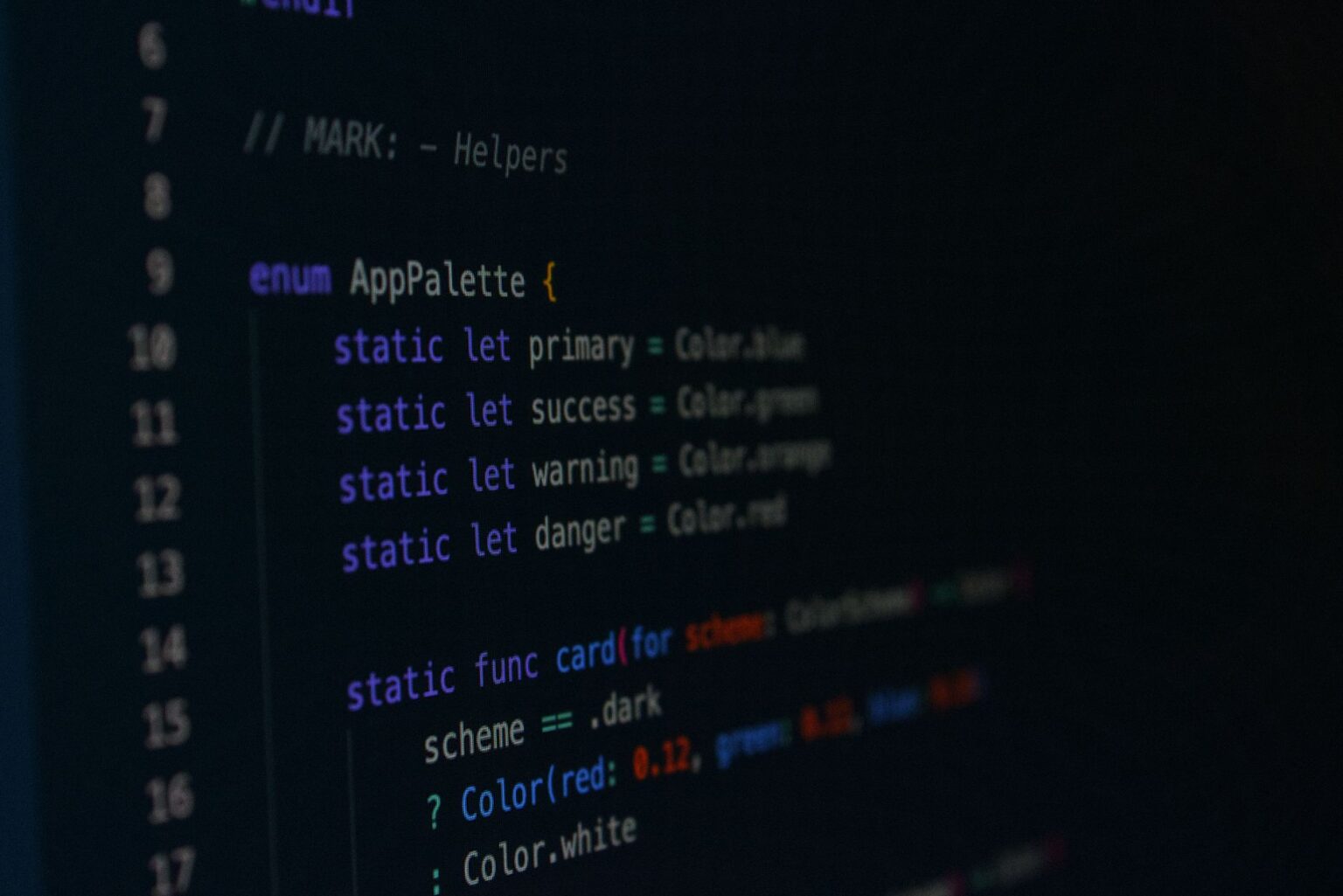 A developer looking at a web application interface on a computer screen