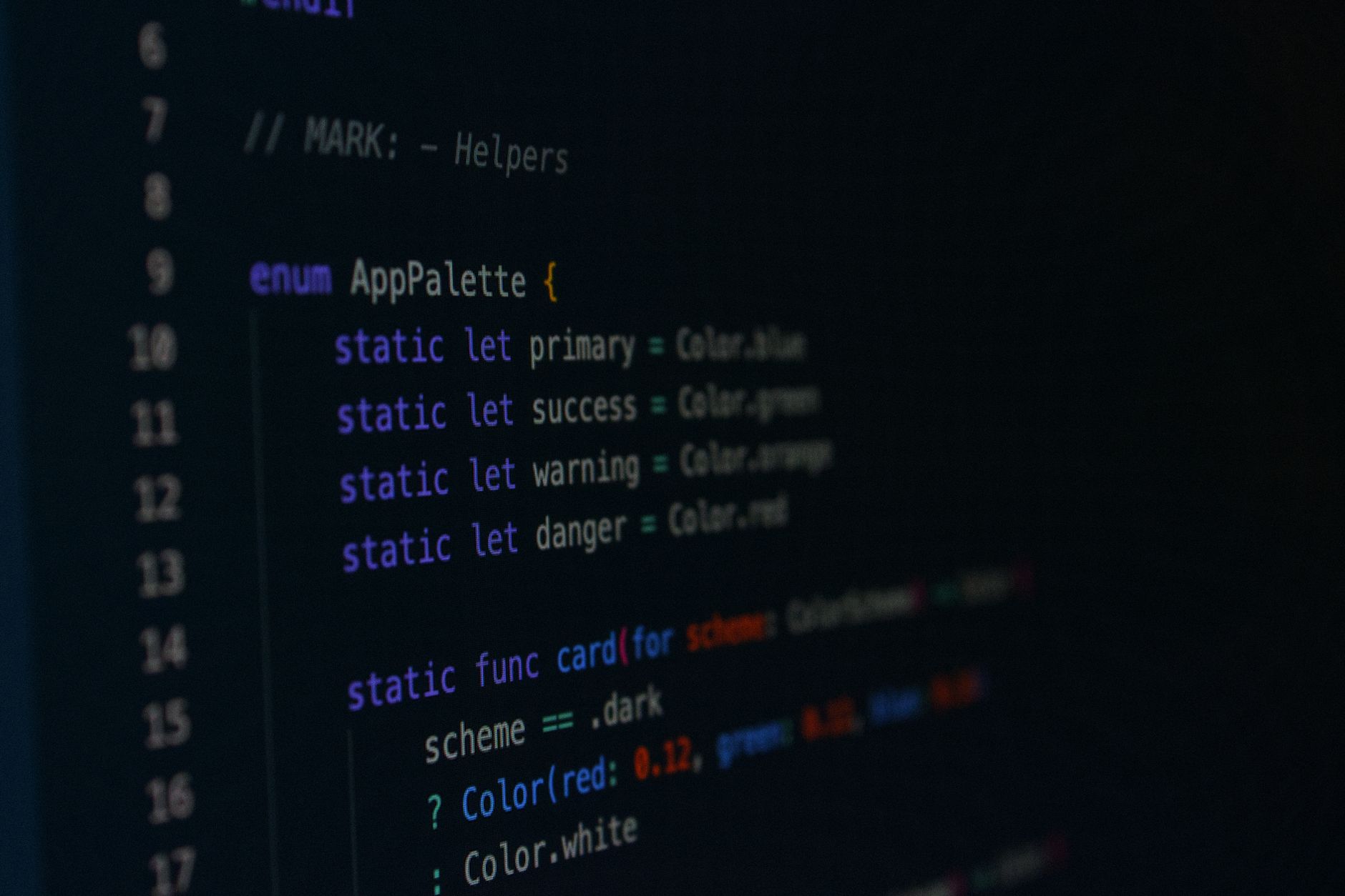 A developer looking at a web application interface on a computer screen