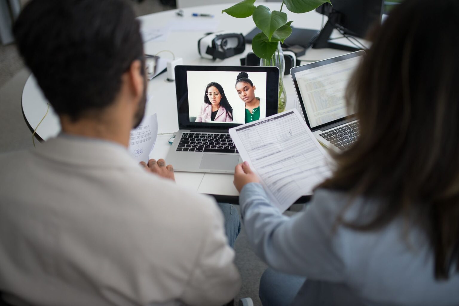Mercor’s AI Hiring Engine Is Squeezing Toptal’s Enterprise Pipeline A person participating in a video interview on a laptop, representing AI-assisted hiring platforms