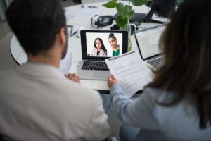 Mercor’s AI Hiring Engine Is Squeezing Toptal’s Enterprise Pipeline A person participating in a video interview on a laptop, representing AI-assisted hiring platforms