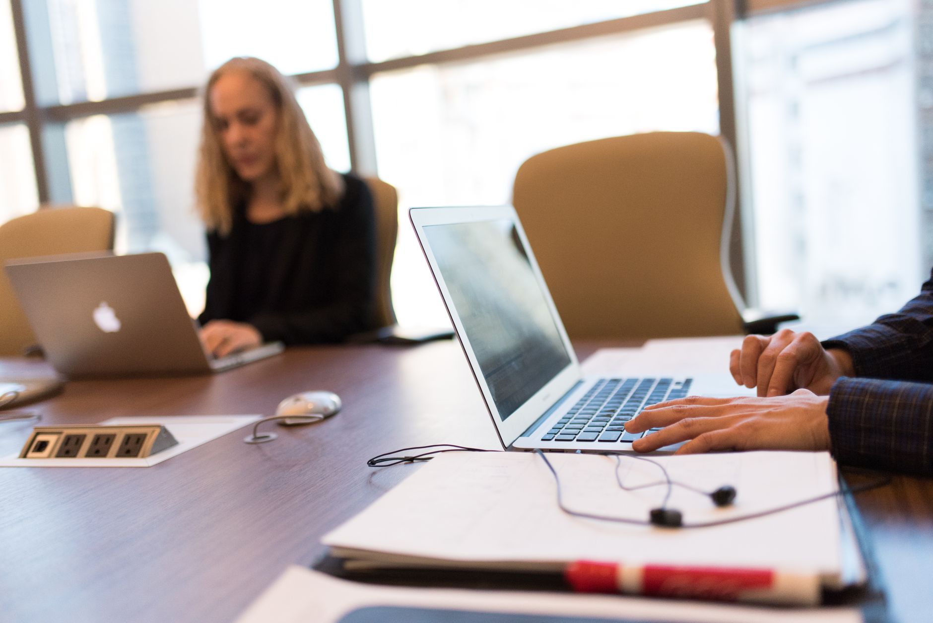 Business professionals reviewing technology strategy in a modern conference room