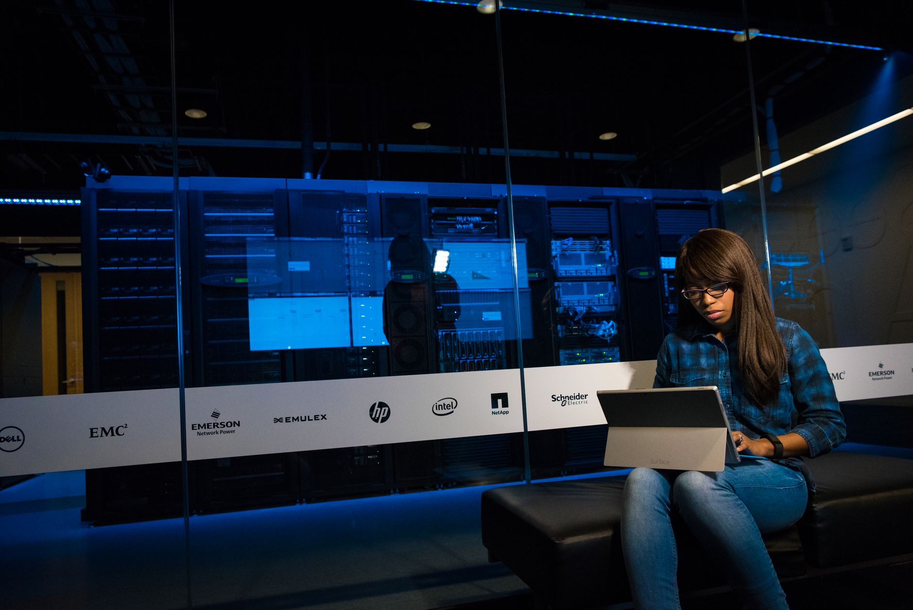 A modern server room representing cloud API infrastructure and compute costs