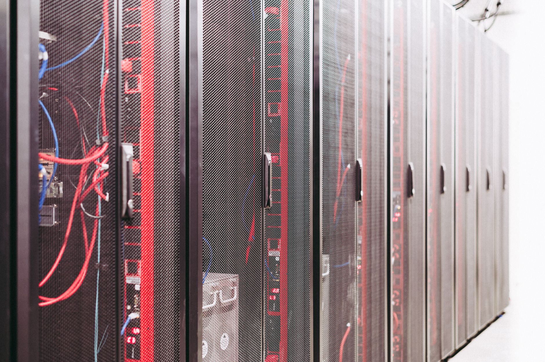 Rows of servers in a data center representing cloud hosting infrastructure