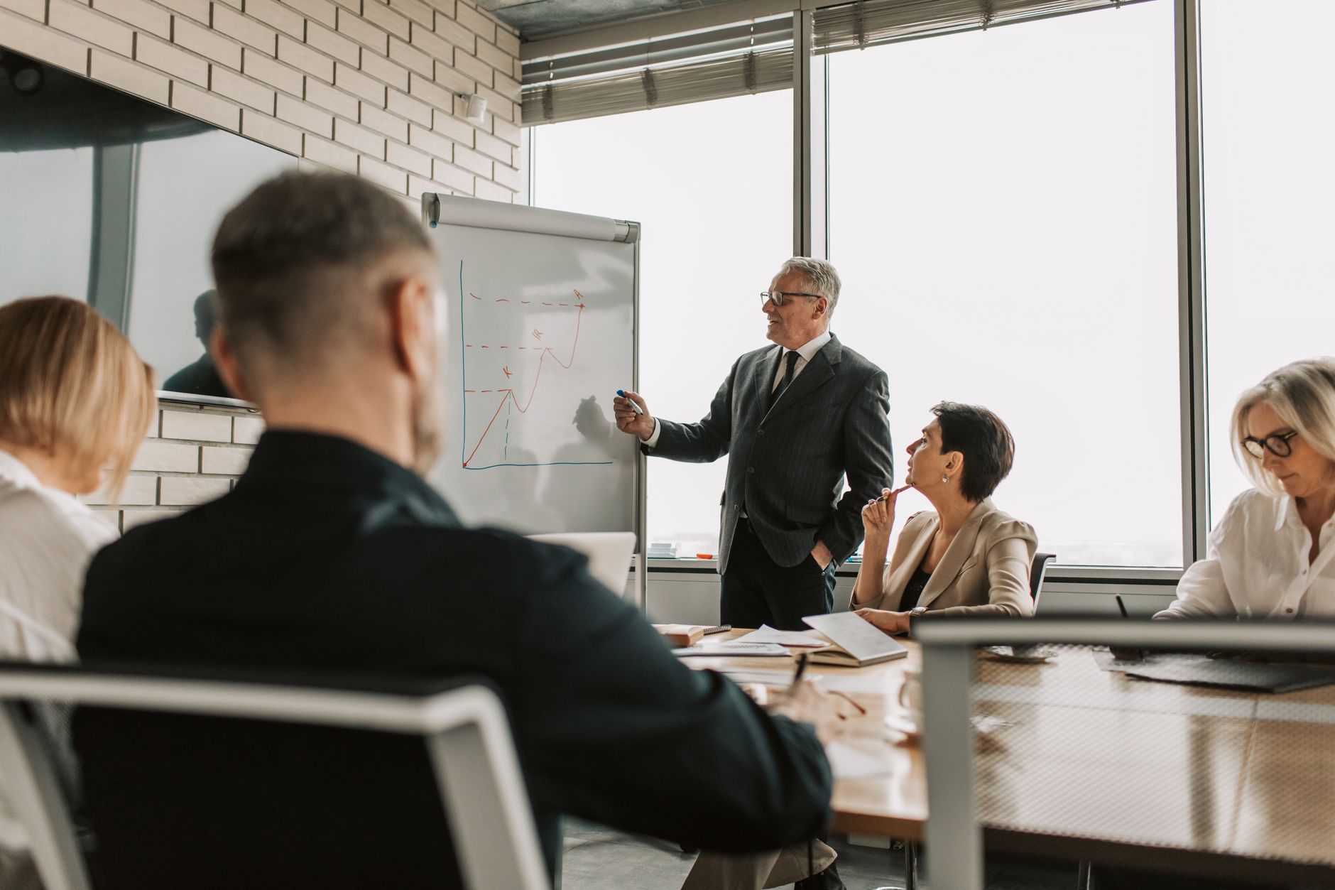 Corporate meeting in a boardroom, representing enterprise software procurement discussions