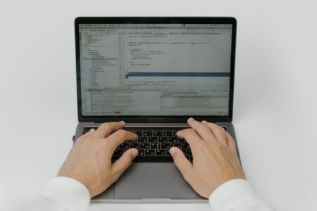 Developer working on a web application in a browser-based code editor