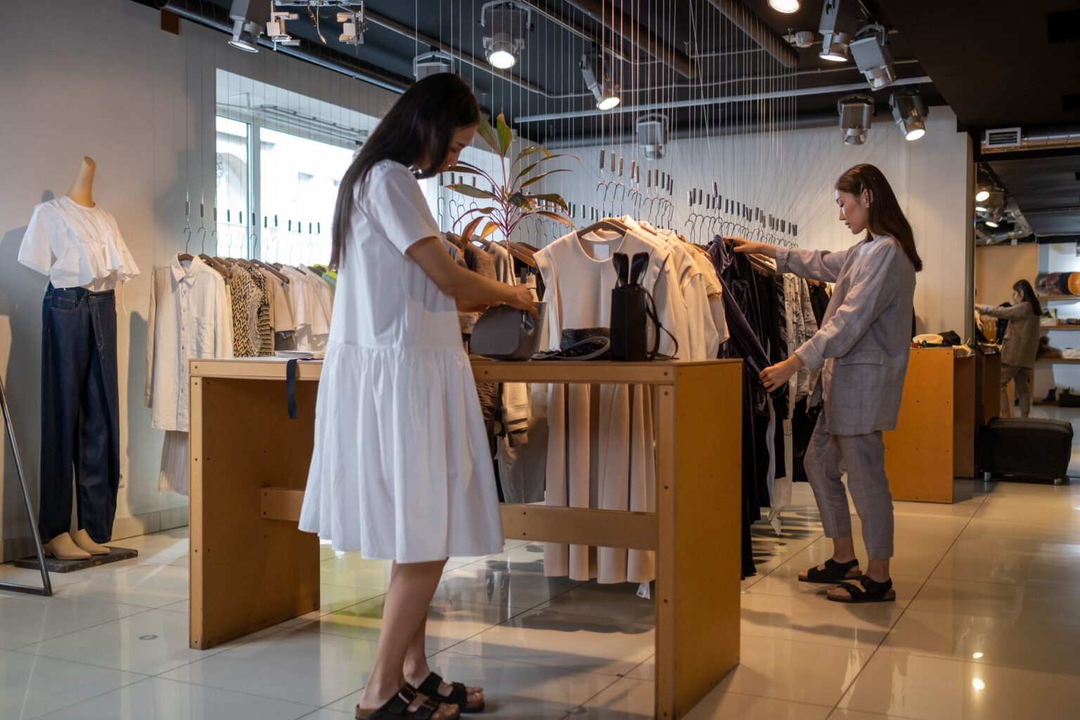 Mercaux’s In-Store AI Layer Is Squeezing Salesfloor’s Retail Base Modern retail store interior with digital displays and product shelving