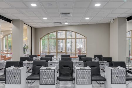 Modern hair salon interior with styling chairs and mirrors