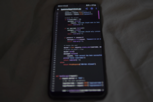 Glide’s No-Code App Builder Is Squeezing Bubble’s SMB Base Developer working on a no-code app interface on a laptop screen