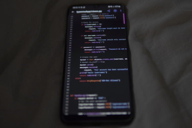 Glide’s No-Code App Builder Is Squeezing Bubble’s SMB Base Developer working on a no-code app interface on a laptop screen