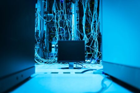 Together AI’s Inference Platform Is Peeling Workloads Away from Replicate Rows of servers in a data center representing AI inference infrastructure
