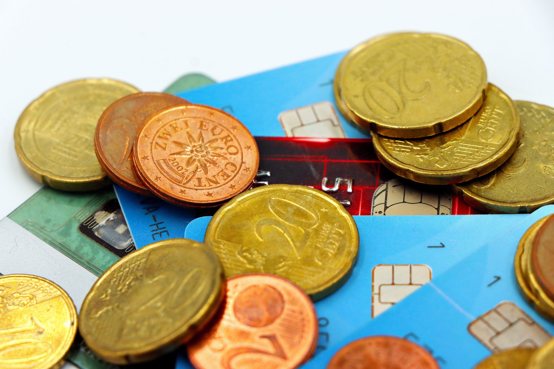 Credit card and cash representing consumer financial tools