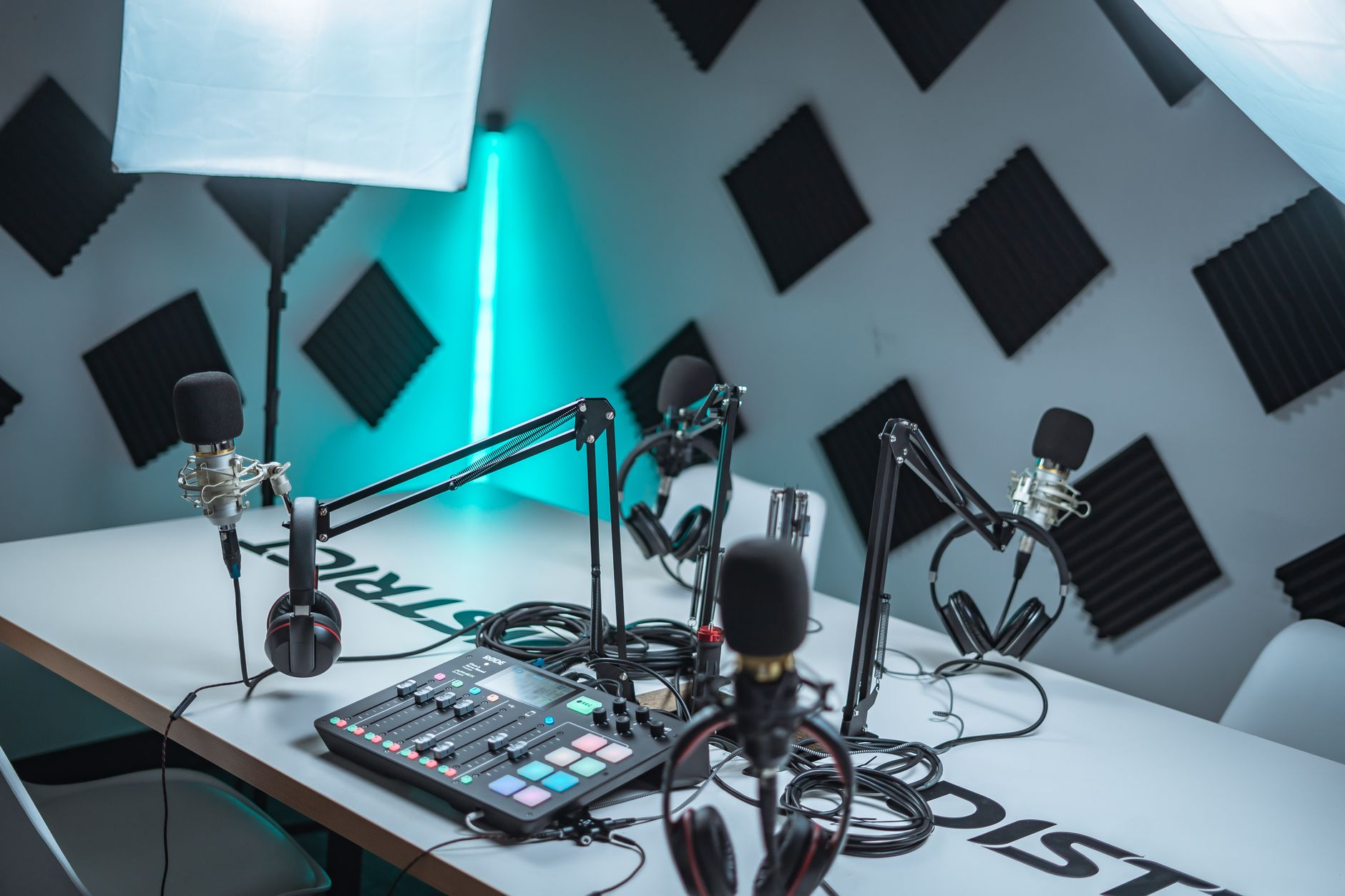 A professional podcast recording studio with microphones and audio equipment
