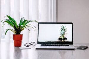 Dust’s Enterprise AI Layer Is Quietly Cornering Glean’s Workflow Base Modern office workspace with multiple screens displaying software dashboards