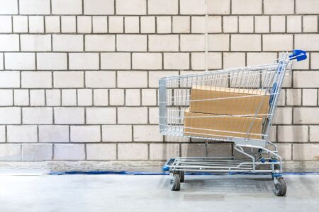 Loop’s Returns Platform Is Quietly Cornering Narvar’s Retail Base Workers processing returned retail packages in a warehouse facility