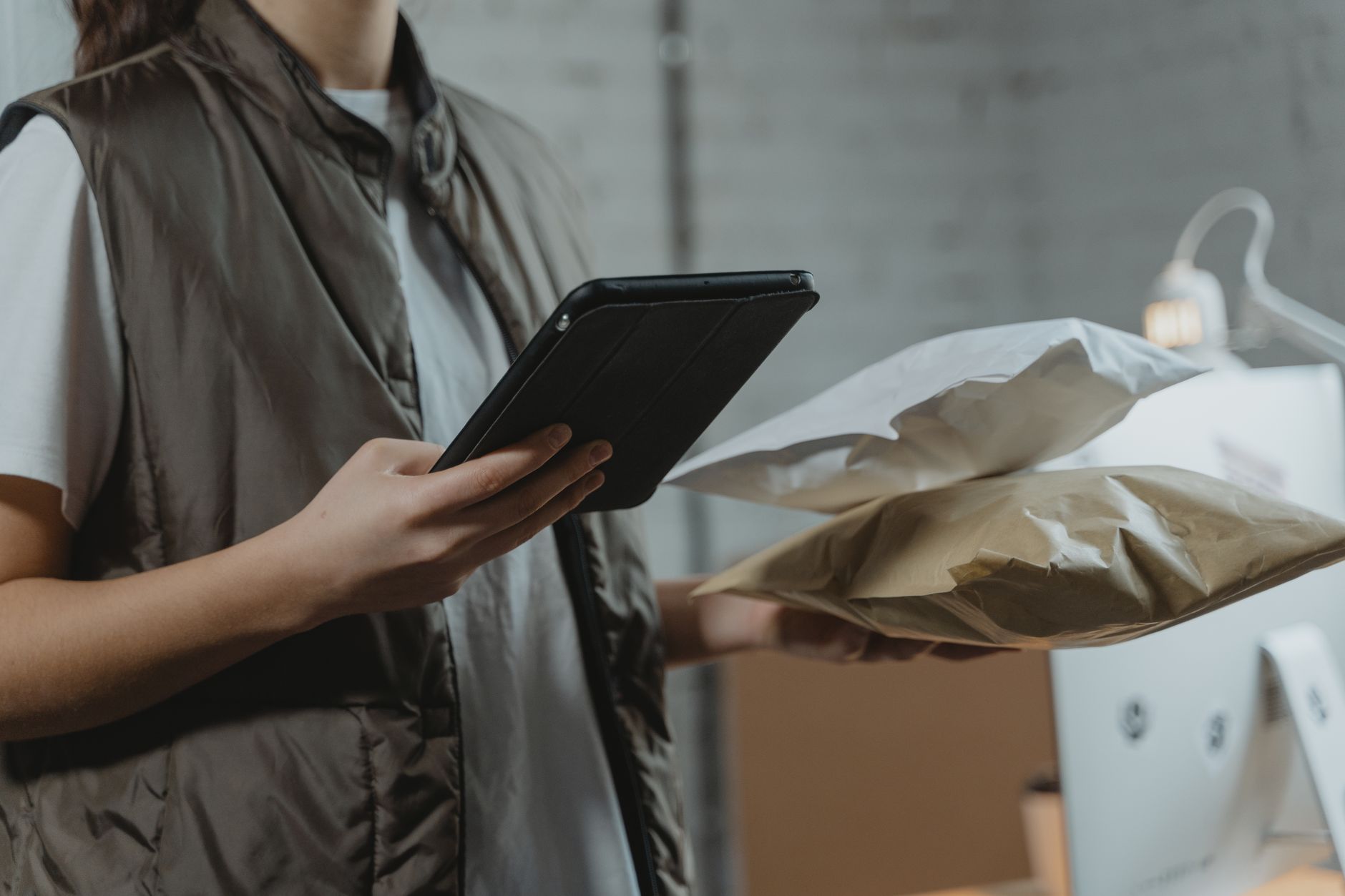 Boxes and shipping labels representing e-commerce order fulfillment and returns
