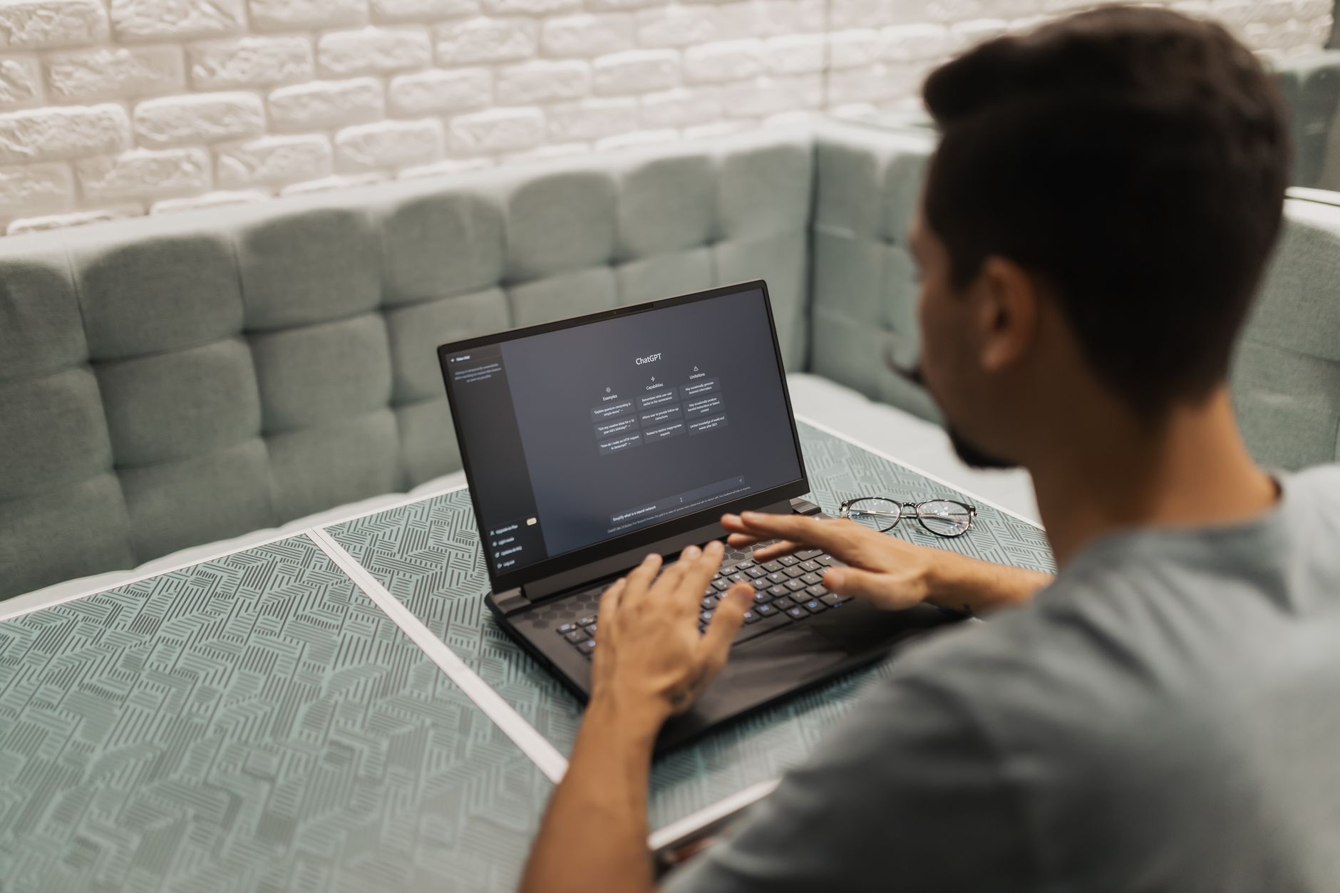 A clean desk workspace with a computer displaying productivity software